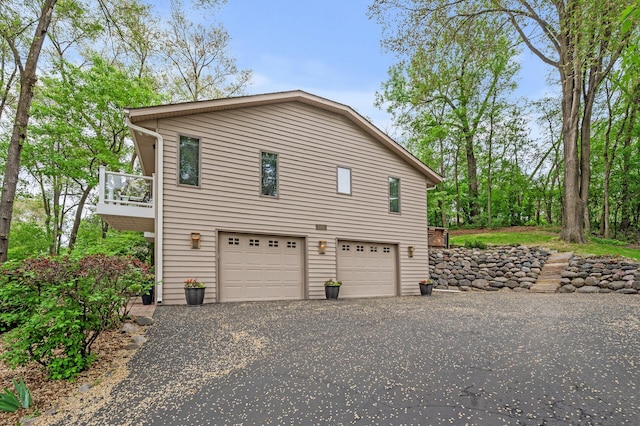 5401 Mount Normandale Dr, Bloomington, MN 55437 - view of home's exterior featuring a garage and driveway
