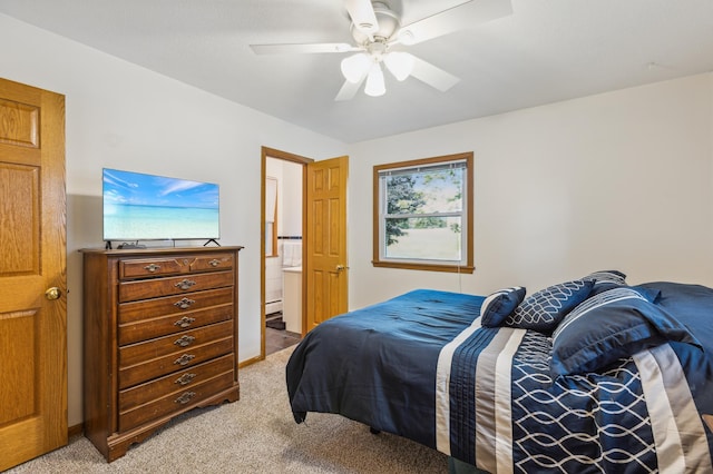 4708 Virginia Ave N, New Hope, MN 55428 - bedroom with light carpet, a ceiling fan, connected bathroom, and baseboard heating