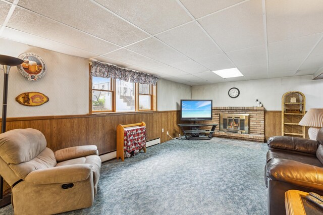 4708 Virginia Ave N, New Hope, MN 55428 - living room with wooden walls, wainscoting, a paneled ceiling, baseboard heating, and carpet floors