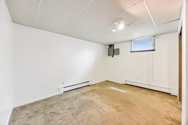 4708 Virginia Ave N, New Hope, MN 55428 - basement featuring a baseboard radiator, baseboard heating, carpet floors, and a drop ceiling