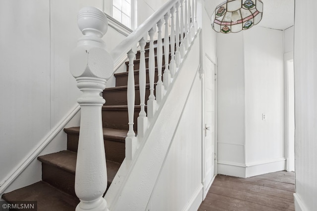 1134 Lincoln St NE, Minneapolis, MN 55413 - stairway with wood finished floors and baseboards