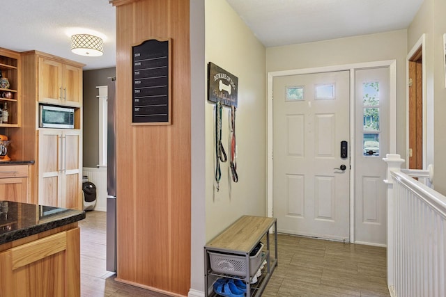 9239 Harbor Ln N, Maple Grove, MN 55369 - foyer featuring baseboards