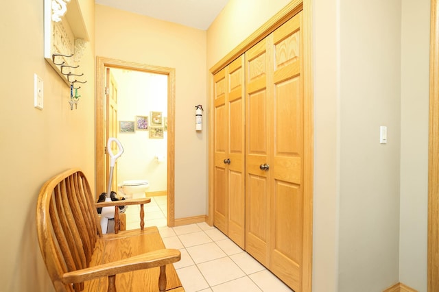 hallway with light tile patterned floors
