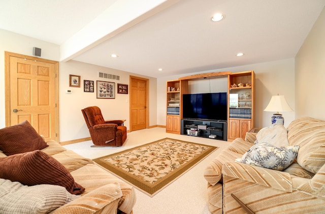 living room with light colored carpet, recessed lighting, and baseboards