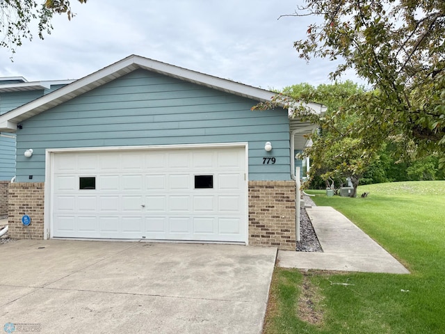 garage featuring driveway