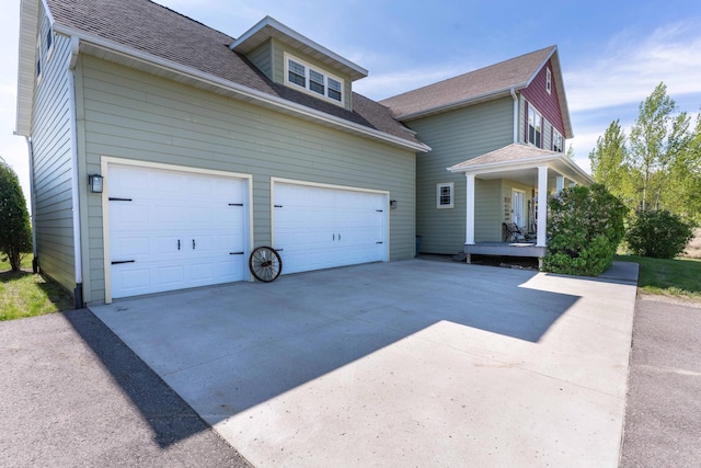 29560 204th Ave, Elizabeth Twp, MN 56537 - view of property exterior with concrete driveway, a shingled roof, and a garage