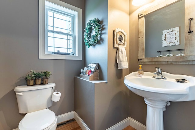 29560 204th Ave, Elizabeth Twp, MN 56537 - bathroom with toilet and baseboards