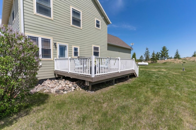 29560 204th Ave, Elizabeth Twp, MN 56537 - back of house with a lawn and a deck