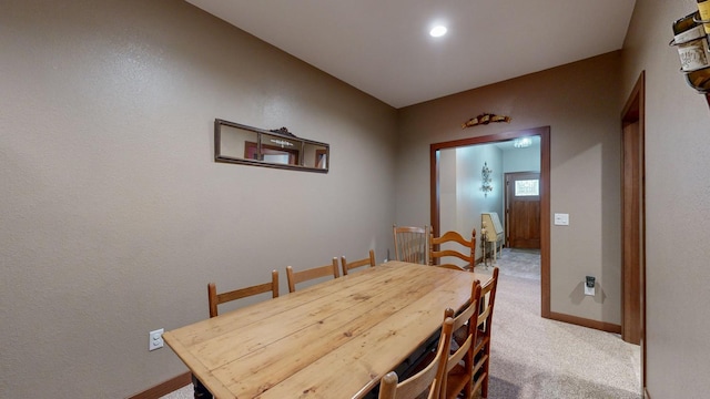 380 7th St SE, Chatfield, MN 55923 - dining space with carpet flooring and baseboards