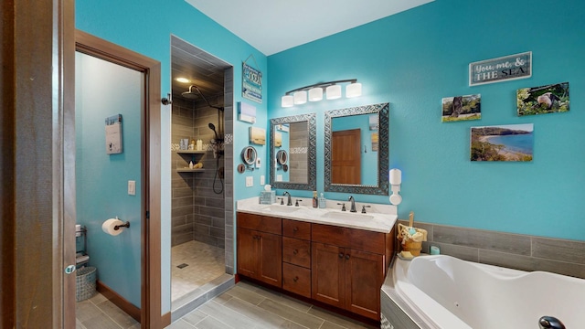 380 7th St SE, Chatfield, MN 55923 - full bathroom with tiled shower, a jetted tub, and double vanity
