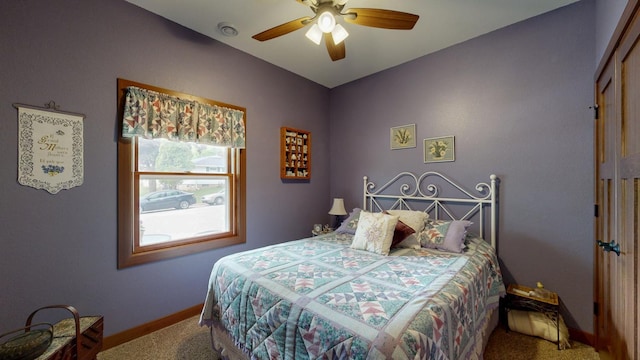 380 7th St SE, Chatfield, MN 55923 - carpeted bedroom featuring baseboards and ceiling fan