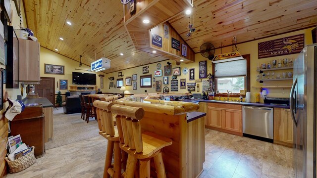 380 7th St SE, Chatfield, MN 55923 - kitchen with stainless steel appliances, a sink, wooden ceiling, open floor plan, and high vaulted ceiling
