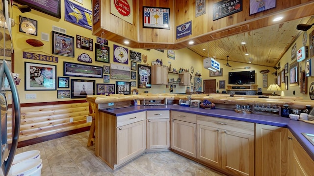 380 7th St SE, Chatfield, MN 55923 - kitchen featuring open floor plan, dark countertops, log walls, high vaulted ceiling, and wooden ceiling