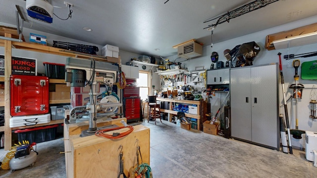 380 7th St SE, Chatfield, MN 55923 - garage featuring a workshop area and a garage door opener