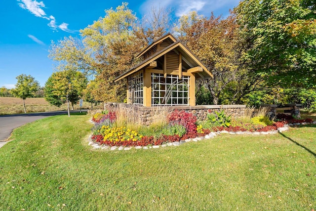 130 Bergamot Dr, Medina, MN 55340 - rear view of property with a lawn