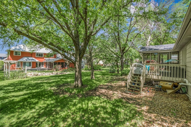 14994 Crane St NW, Andover, MN 55304 - view of grassy yard with a wooden deck and stairs