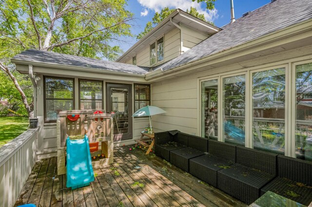 14994 Crane St NW, Andover, MN 55304 - wooden deck with an outdoor hangout area and a sunroom