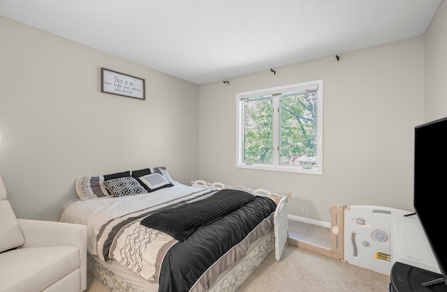 14994 Crane St NW, Andover, MN 55304 - carpeted bedroom featuring baseboards
