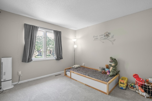 14994 Crane St NW, Andover, MN 55304 - bedroom featuring carpet floors and a textured ceiling