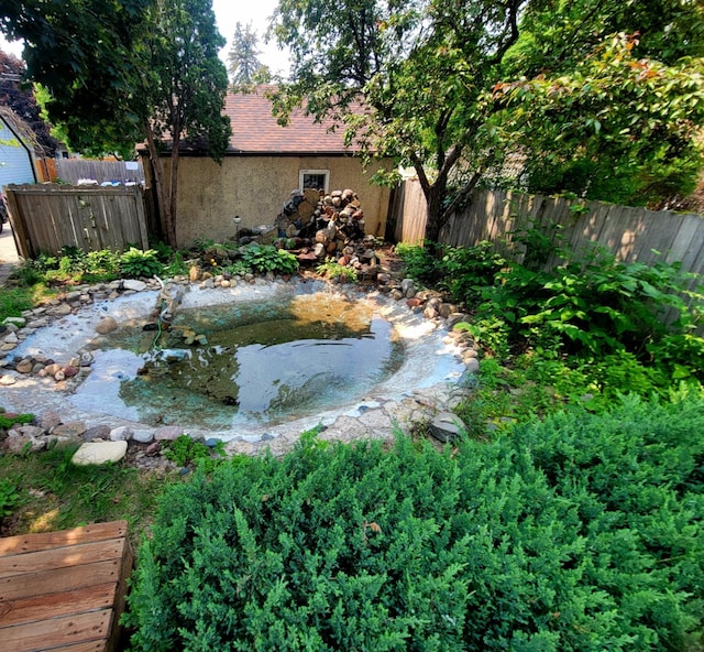4207 Vincent Ave, Minneapolis, MN 55412 - view of yard featuring a small pond
