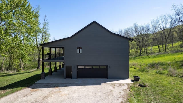 29572 Morgan Rd, Wykoff, MN 55990 - view of side of home featuring driveway and a garage