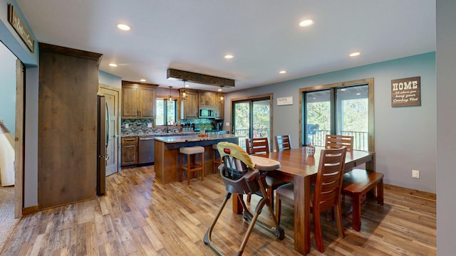 29572 Morgan Rd, Wykoff, MN 55990 - dining space with light wood-type flooring and recessed lighting
