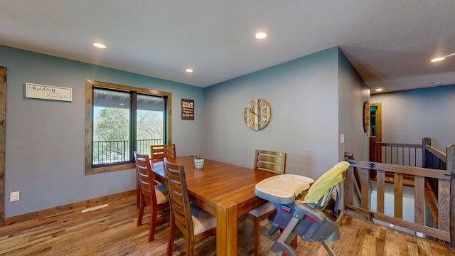 29572 Morgan Rd, Wykoff, MN 55990 - dining area with wood finished floors, recessed lighting, and baseboards