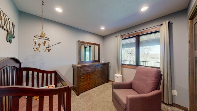 29572 Morgan Rd, Wykoff, MN 55990 - bedroom with light colored carpet, baseboards, recessed lighting, and a chandelier