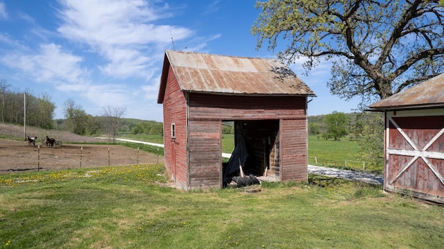 29572 Morgan Rd, Wykoff, MN 55990 - view of outdoor structure featuring an outbuilding and a view of countryside