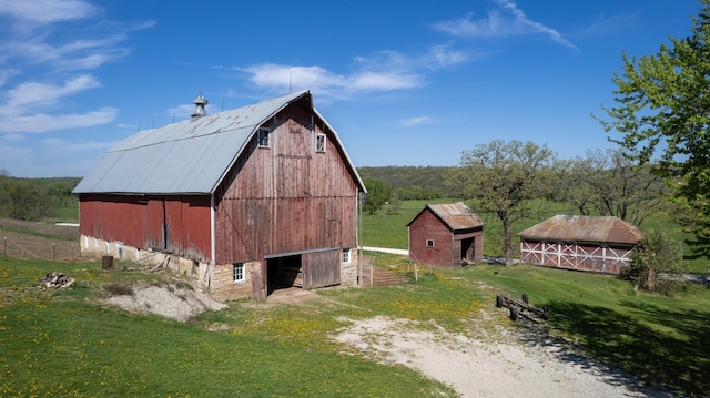 29572 Morgan Rd, Wykoff, MN 55990 - view of barn with dirt driveway and a yard