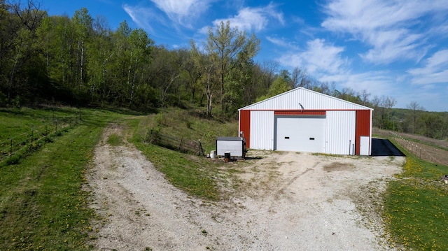 29572 Morgan Rd, Wykoff, MN 55990 - detached garage with fence and dirt driveway