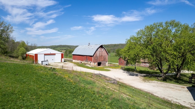 29572 Morgan Rd, Wykoff, MN 55990 - view of yard with a garage, a barn, an outdoor structure, and driveway