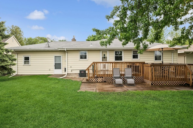 621 Irving Ave NW, Elk River, MN 55330 - back of house featuring a deck, a yard, a chimney, and cooling unit