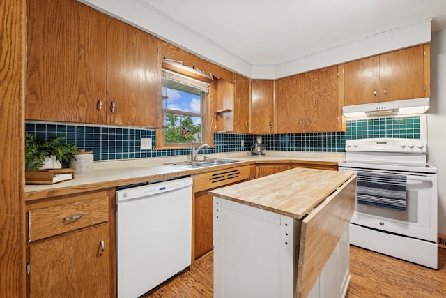 621 Irving Ave NW, Elk River, MN 55330 - kitchen featuring white appliances, a sink, under cabinet range hood, butcher block countertops, and light wood-type flooring