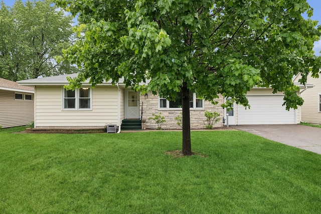 621 Irving Ave NW, Elk River, MN 55330 - view of property hidden behind natural elements with concrete driveway, entry steps, a front yard, and central AC