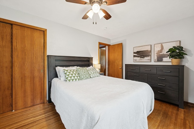 621 Irving Ave NW, Elk River, MN 55330 - bedroom with dark wood-style flooring and ceiling fan