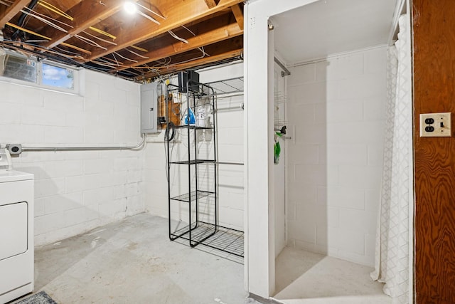 621 Irving Ave NW, Elk River, MN 55330 - bathroom featuring washer / dryer, electric panel, concrete floors, and a tile shower