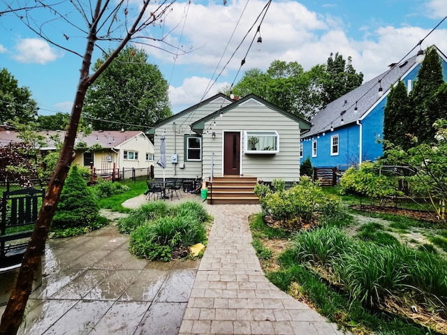 1093 Smith Ave S, West Saint Paul, MN 55118 - view of front of property featuring a patio area