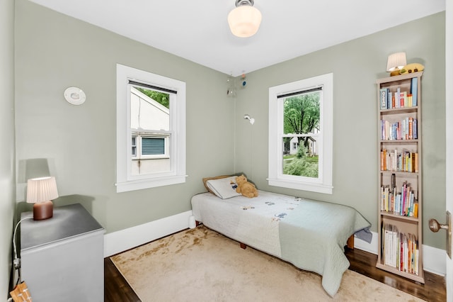 1093 Smith Ave S, West Saint Paul, MN 55118 - bedroom featuring wood finished floors and baseboards