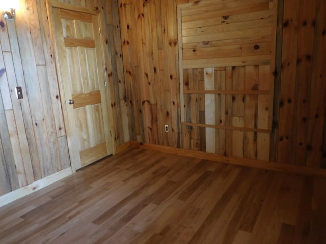 31649 250th Ave, Wendell, MN 56590 - unfurnished room with wood walls and wood finished floors
