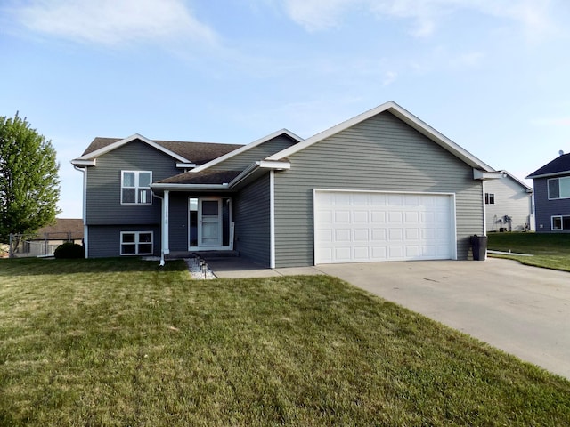 1173 Lone Stone Ct SE, Chatfield, MN 55923 - split level home with an attached garage, concrete driveway, and a front yard