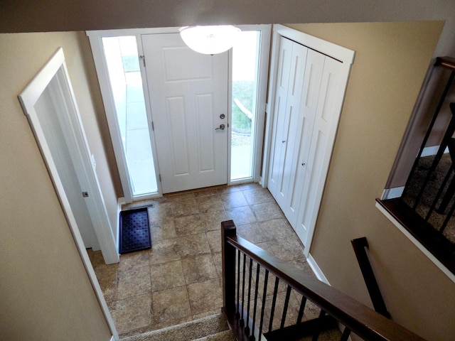 1173 Lone Stone Ct SE, Chatfield, MN 55923 - entryway featuring stairs and stone finish floors