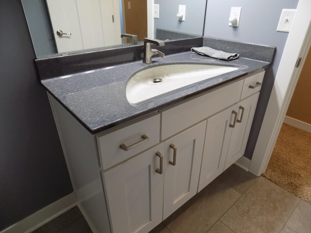 1173 Lone Stone Ct SE, Chatfield, MN 55923 - bathroom featuring vanity, baseboards, and tile patterned flooring