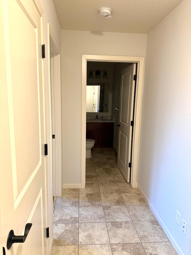 628 20th Ave S, Minneapolis, MN 55454 - hall featuring baseboards and light tile patterned floors