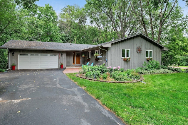 18520 29th Ave N, Plymouth, MN 55447 - single story home with asphalt driveway, a garage, and a front lawn