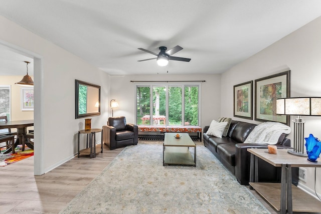18520 29th Ave N, Plymouth, MN 55447 - living room featuring light wood-style flooring and ceiling fan