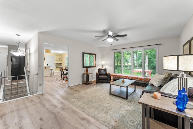 18520 29th Ave N, Plymouth, MN 55447 - living room with light wood-style floors and ceiling fan