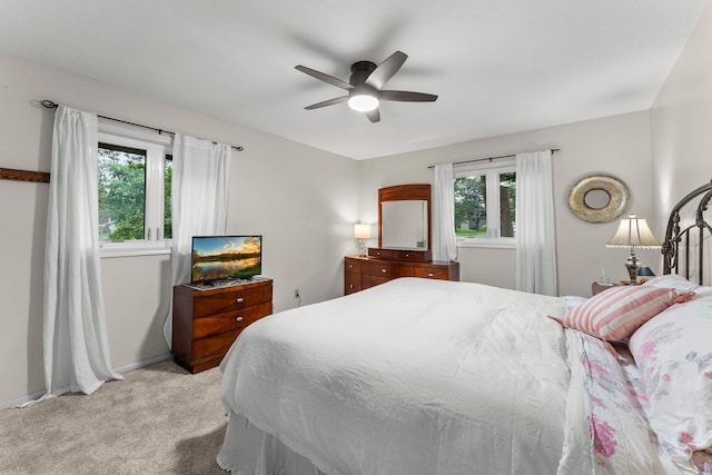 18520 29th Ave N, Plymouth, MN 55447 - bedroom with light carpet and a ceiling fan