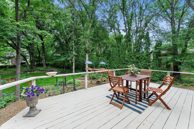 18520 29th Ave N, Plymouth, MN 55447 - wooden deck with outdoor dining area