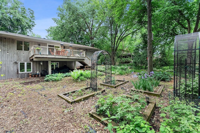 18520 29th Ave N, Plymouth, MN 55447 - view of yard featuring a garden and a deck